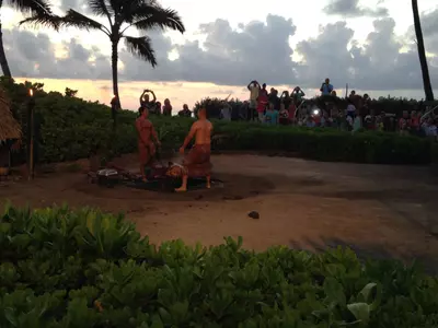 The imu ceremony: taking the roasted pig out of the underground oven