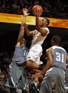 Andre Hollins will look to join the 1,000-point club when the Gophers host Omaha on Friday.