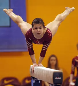 Senior Justine Cherwink performed on the beam and floor Monday.