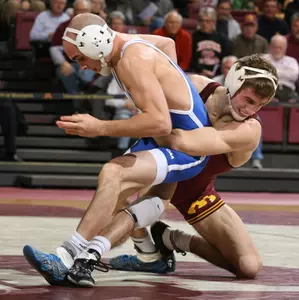 David Thorn notched a pin (2:42) over Wisconsin's Cavallaris to kick-off the Gopher domination.