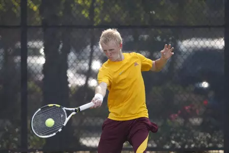 Eric Frueh was victorious in both singles and doubles play front of a hometown crowd in Rochester, Minn.
