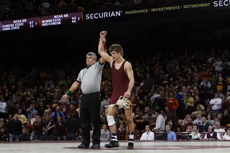 Dylan Ness pinned Mike Kelly to give Minnesota its first lead of the match.