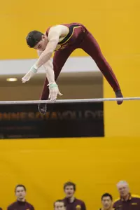 Daniel DiBenedetto placed fourth in the high bar after the first day of competition with a 14.200.