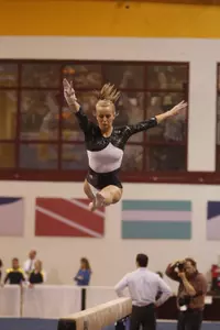 Shannon Golich tied for third on beam with a career-best 9.925.