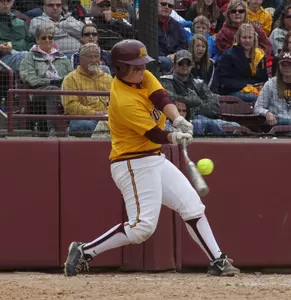 Kari Dorle's three-run double in the fourth put the Gophers up, 7-3.