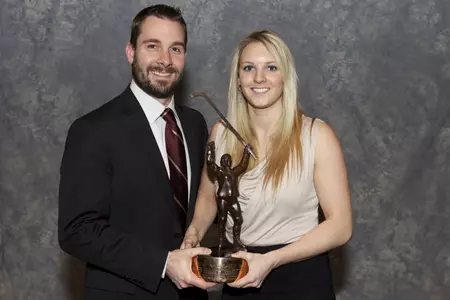 Amanda Kessel with head coach Brad Frost.