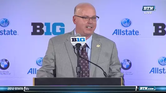 Jerry Kill addresses the media.