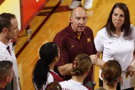 Gopher head coach Hugh McCutcheon (left) and associate coach Laura Bush