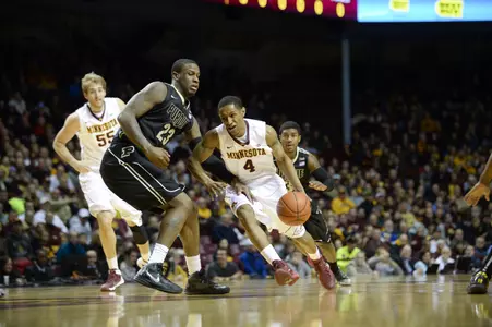 DeAndre Mathieu and the Gophers face a tough test at fifth-ranked Michigan State on Saturday.