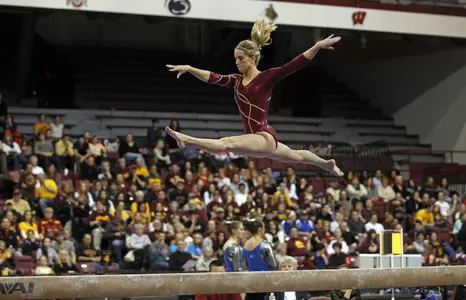 Schermann performs on the balance beam in the Gophers' first home meet.