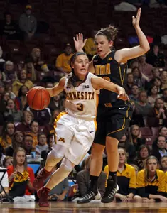 Shayne Mullaney drives to the basket against Iowa on Wednesday night at Williams Arena
