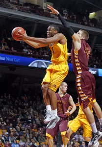 Senior Andre Hollins scored 22 points in the season opener last Friday.