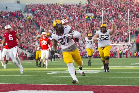David Cobb eclipsed Laurence Maroney's school record for rushing yards in a season.
