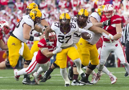 David Cobb, Minnesota's first 1,500 yard rusher, received the Bronko Nagurski Award, which is given annually to the team's most valuable player.