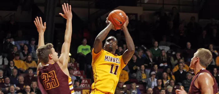 Junior Carlos Morris led all scorers with 23 points in his unofficial Gopher debut.