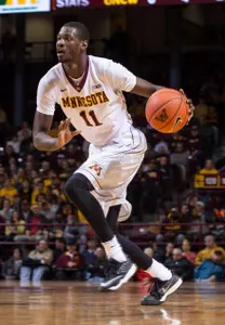 Carlos Morris looks to attack the basket.