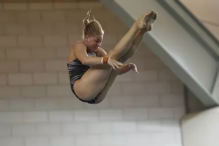 Maggie Keefer repeated as the 3-meter diving champion.