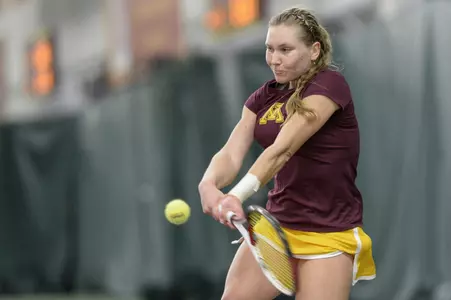 Natallia Pintusava won in both singles and doubles Monday.