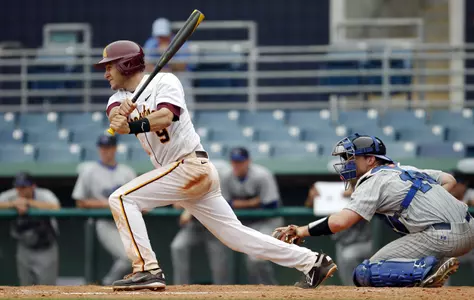 Handel's grand slam boosted the Gophers to a win in the noon game.