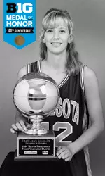 Carol Ann (Shudlick) Smith with the Wade Trophy.