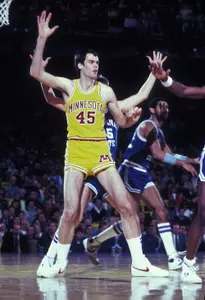 Breuer's career scoring and blocks rank in the top three among all-time Gophers.