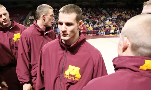Dustin Schlatter earned a national title and three All-America medals as a wrestler at Minnesota.