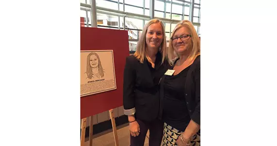 Coach Merchant with mom Deb Merchant at the ceremony
