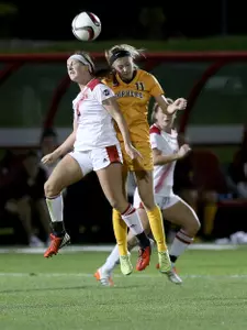 Junior Josee Stiever added the first point of the match against Rutgers off a double assist from sophomores Maddie Gaffney and Tori Burnett