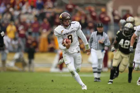 Former Gopher quarterback Adam Weber is now the team's offensive graduate assistant.