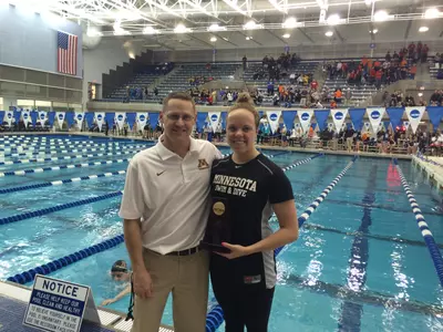 Head coach Kelly Kremer with the 2015 200 breast NCAA Champion: Kierra Smith