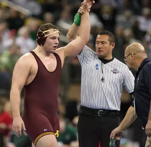 Michael Kroells has been both an All-American and an NWCA All-Academic honoree each of the past two seasons.