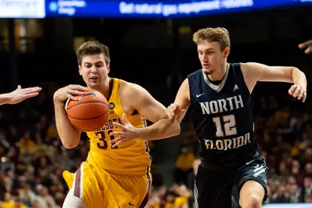 Minnesota Gophers guard Brock Stull (31)