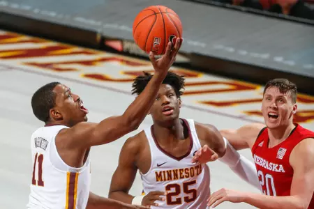 Isaiah Washington (11), Daniel Oturu (25), Tanner Borchardt (20)NCAA Men's Basketball: Nebraska at Minnesota