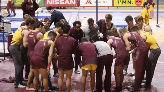 MGym team huddle Alumni Meet