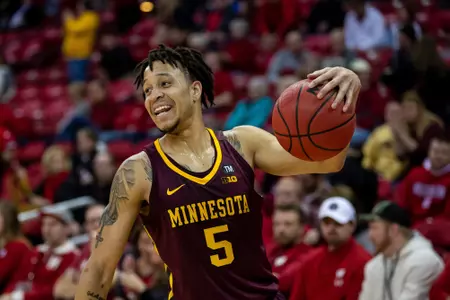 Minnesota Gophers guard Amir Coffey (5)