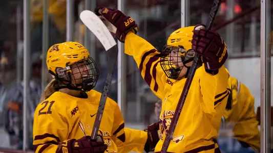 Emily Oden (21), Taylor Heise (9)