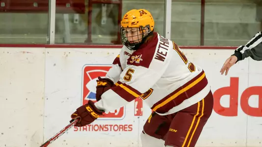 Rosy Demers (81), Madeline Wethington (5)NCAA Hockey: Colgate v Minnesota