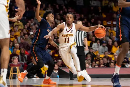 Minnesota Gophers guard Isaiah Washington (11)