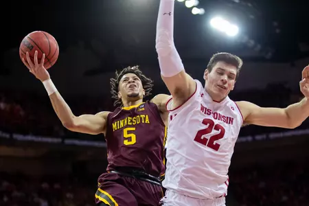 Minnesota Gophers guard Amir Coffey (5)