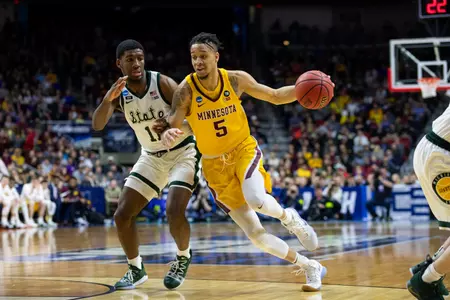 Minnesota Gophers guard Amir Coffey (5)