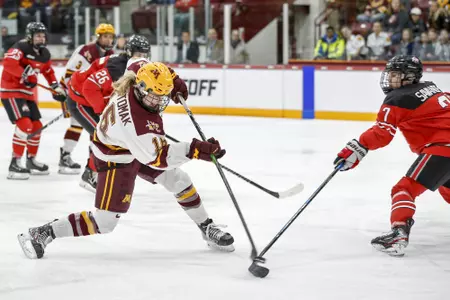 Amy Potomak (16) shoots her goal.