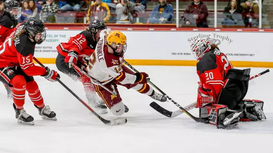 Grace Zumwinkle (12), Andrea Braendli (20)Ohio State v Minnesota2020 WCHA Final Faceoff