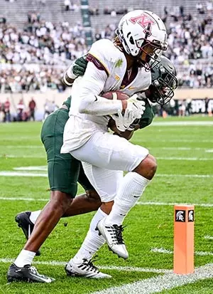 Minnesota's Daniel Jackson catches a touchdown as Michigan State's Ameer Speed defends during the fourth quarter on Saturday, Sept. 24, 2022, at Spartan Stadium in East Lansing.
220924 Msu Minn Fb 150a