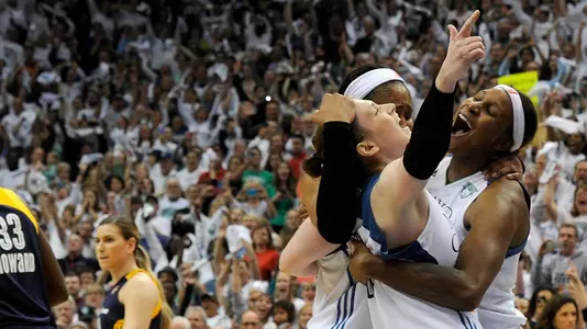 MINNEAPOLIS, MN - OCTOBER 14: (L-R) Lindsay Whalen #13, Maya Moore #23 and Sylvia Fowles #34 of the Minnesota Lynx celebrate a win in Game Five of the 2015 WNBA Finals against the Indiana Fever on October 14, 2015 at Target Center in Minneapolis, Minnesota. The Lynx defeated the Fever 69-52 to win the WNBA Championship. NOTE TO USER: User expressly acknowledges and agrees that, by downloading and or using this Photograph, user is consenting to the terms and conditions of the Getty Images License Agreement. (Photo by Hannah Foslien/Getty Images)