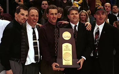 coaches with trophy