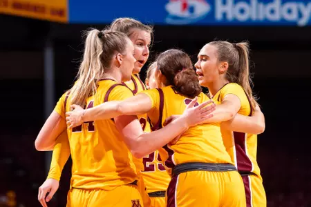 team huddle against lindenwood in 2023