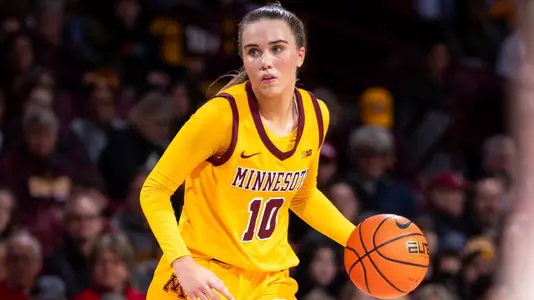 mara braun in gold uniform in 2024