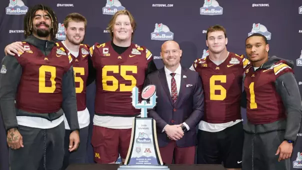 Rate Bowl trophy, Coach Fleck, Team
