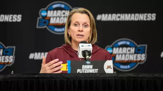 Minnesota women's basketball coach Dawn Plitzuweit speaks with the media at the NCAA Tournament