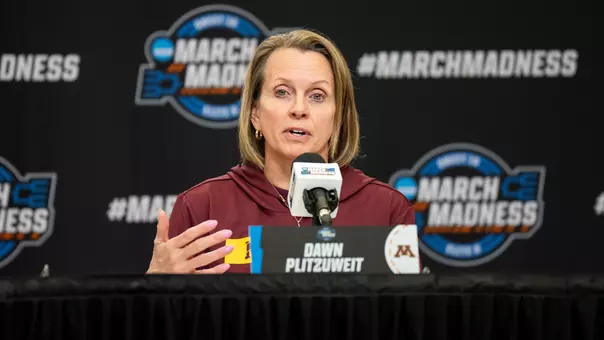 Minnesota women's basketball coach Dawn Plitzuweit speaks with the media at the NCAA Tournament